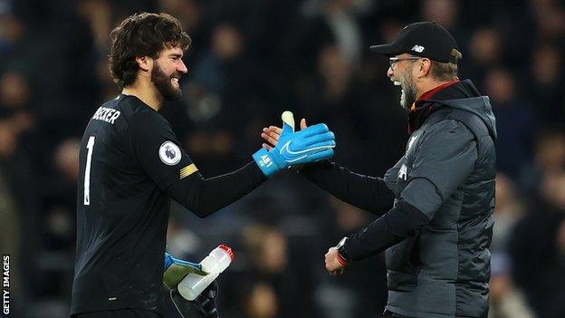 Alisson and Jurgen Klopp