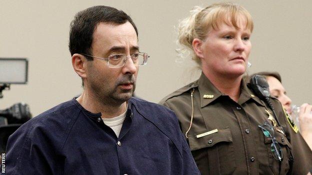 Larry Nassar (left)