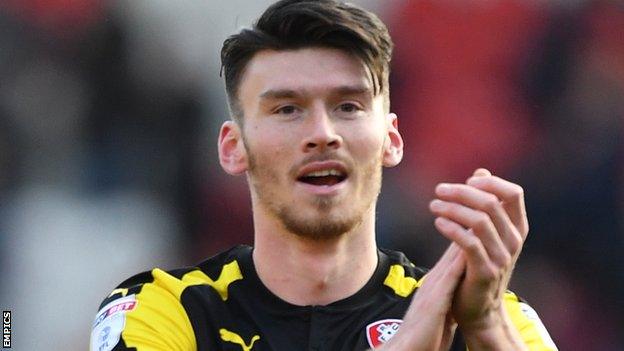 Kieffer Moore applauds Rotherham fans after scoring a 90th minute equaliser against Doncaster in November