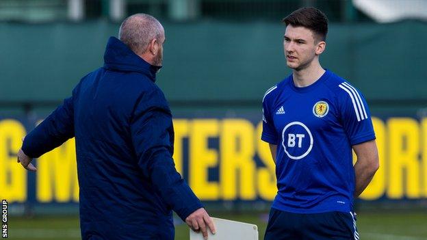 Steve Clarke speaks to Kieran Tierney in Scotland training