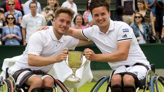 Gordon Reid (right) shows off the doubles trophy with his partner Alfie Hewett