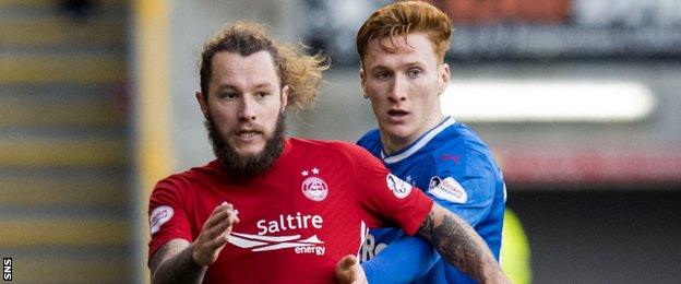 Aberdeen's Stevie May and Rangers' David Bates