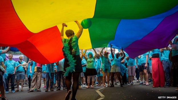 Members of the Lesbian, Gay, Bisexual and Transgender (LGBT) community take part in the Pride Parade in London