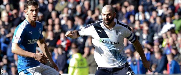 Skipper Gary Harkins tried to inspire Dundee but he and his team-mates could not stop Rangers making it nine wins in a row over them