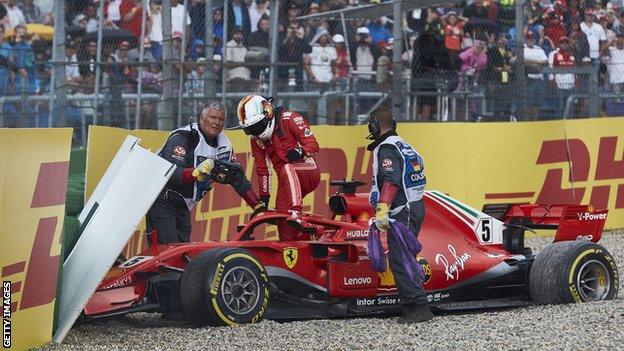 Ferrari F1 driver Sebastian Vettel crashes in to barrier at the 2018 German Grand Prix