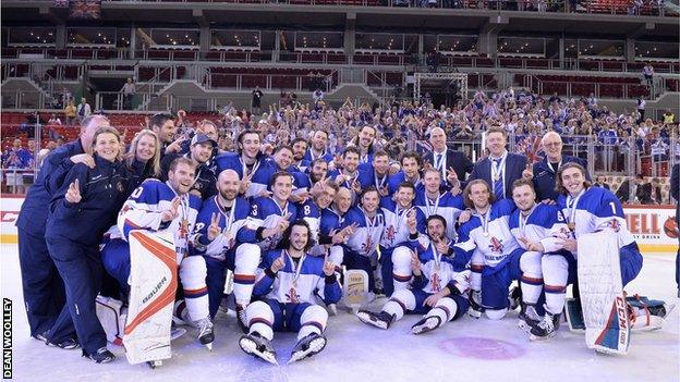 Great Britain ice hockey team celebrate beating Hungary