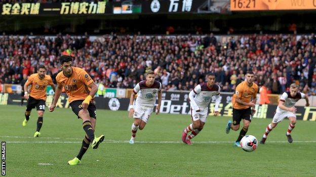 Raul Jimenez scores from the penalty spot