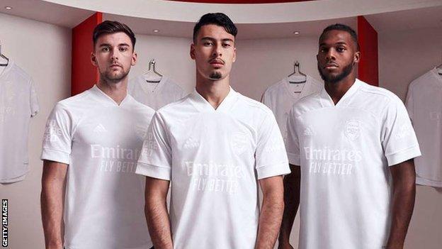 Arsenal players in white kit