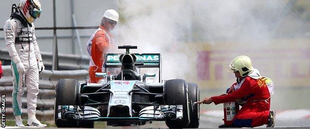 Lewis Hamilton's car sets on fire during Q1 of the Hungarian grand prix