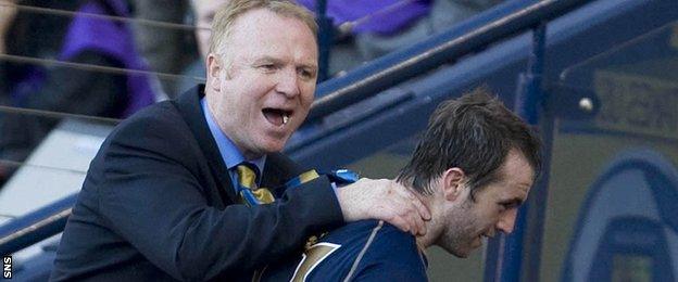 Alex McLeish congratulates James McFadden with Scotland