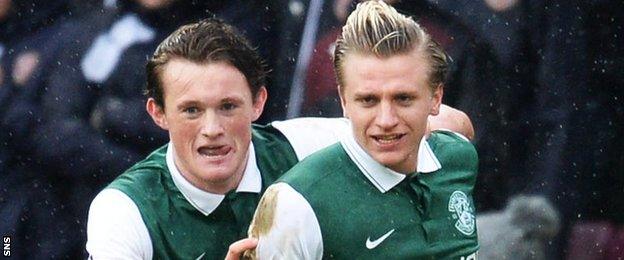 Liam Henderson (left) and Jason Cummings celebrate a Hibs goal