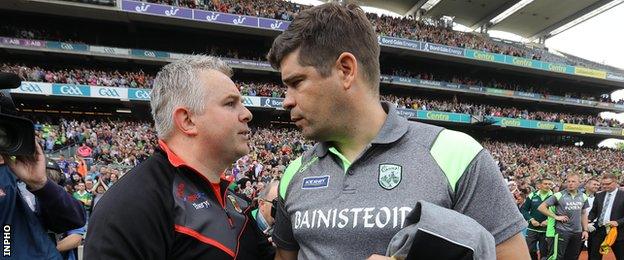 Mayo manager Stephen Rochford with Kerry manager Eamonn Fitzmaurice after the final whistle at Croke Park