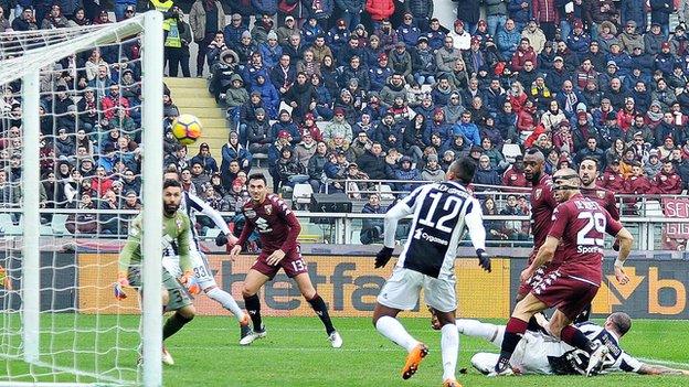 Alex Sandro turned in Federico Bernardeschi's cross as Juventus beat city rivals Torino