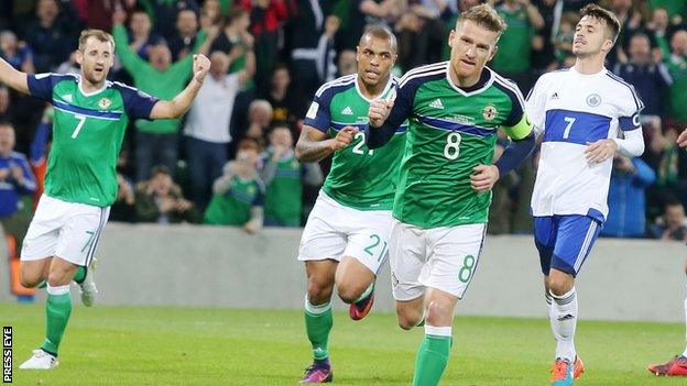 Northern Ireland captain Steven Davis celebrates after scoring against San Marino