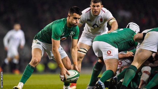 Conor Murray prepares to launch a box kick for Ireland against England