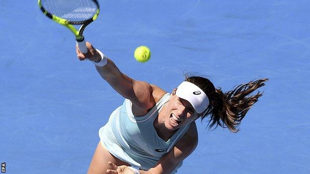 Johanna Konta serves during her first-round match at the Australian Open