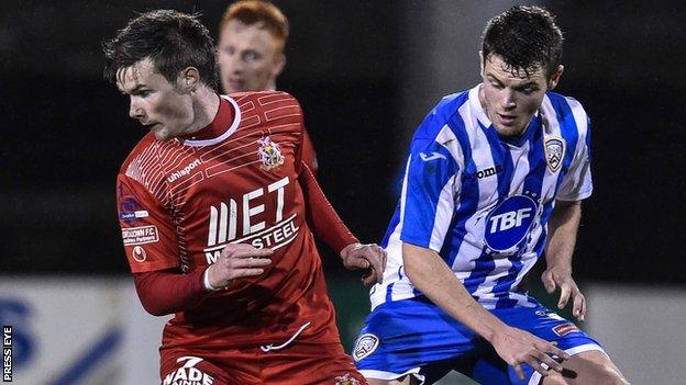 Peter McMahon (left) in action against Coleraine in 2014