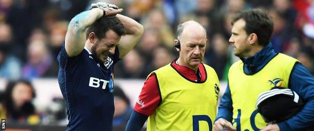 Scotland captain Greig Laidlaw is forced off injured