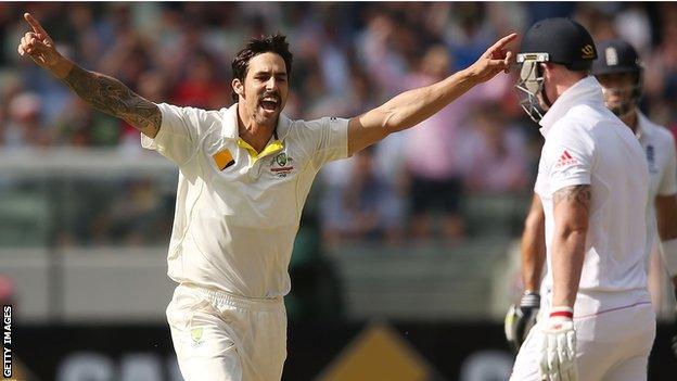 Mitchell Johnson celebrates the wicket of Ben Stokes