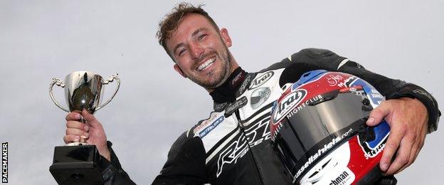 Paul Jordan celebrates winning the opening Supersport race at the 2018 Armoy road races