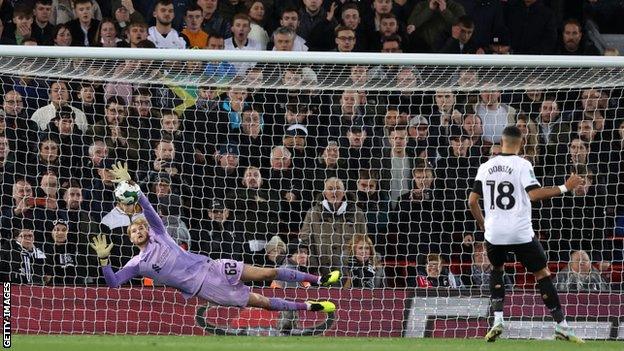 Caoimhin Kelleher saves Lewis Dobbin's penalty