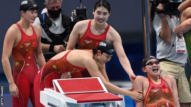 China celebrate winning 4x200m freestyle gold