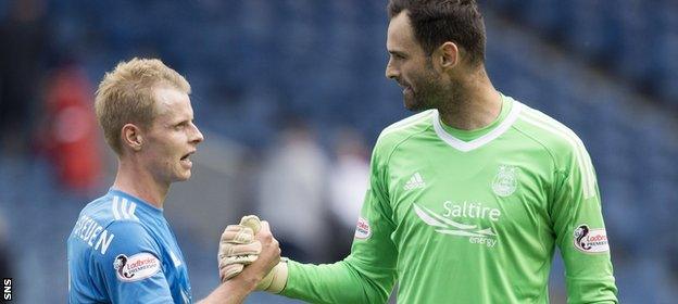 Forward Gary Mackay-Steven shakes hands with Joe Lewis