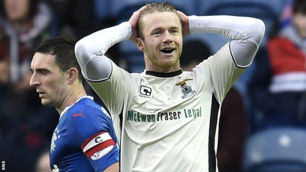 Alex Fisher reflects ruefully after his late strike is saved by Wes Foderingham