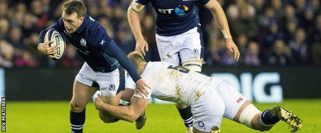 Stuart Hogg makes a break against England