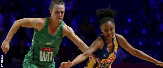 Northern Ireland"s Niamh Cooper challenges Damisha Croney of Barbados during Thursday's win