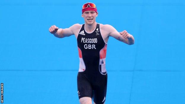 George Peasgood crosses the line at the Tokyo Paralympics