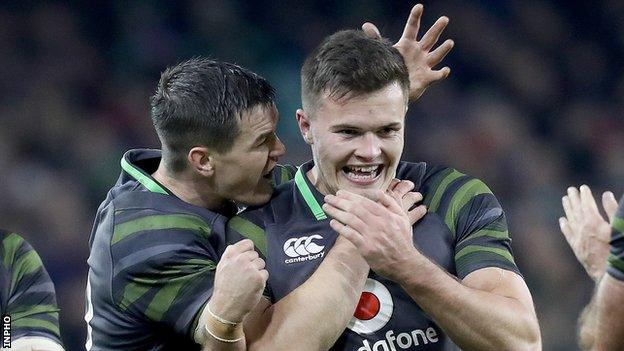 Johnny Sexton congratulates Jacob Stockdale after one of the Ulsterman's Ireland tries