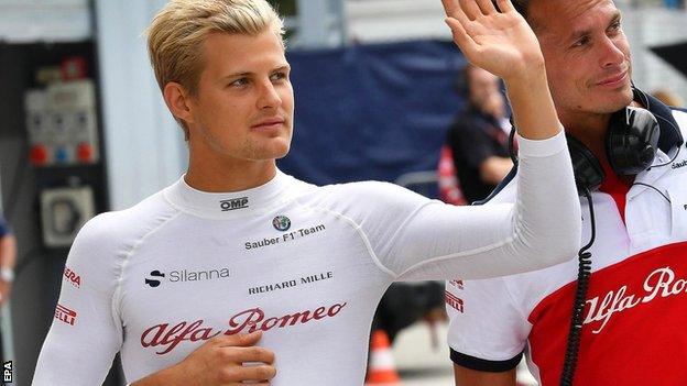 Marcus Ericsson waves to the Monza crowd after his huge accident