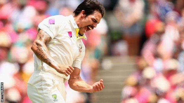 Mitchell Johnson celebrates taking a wicket