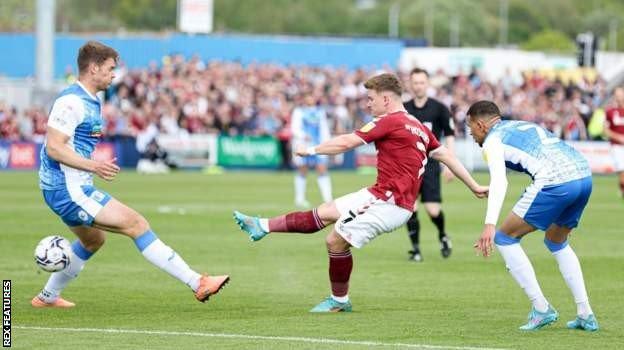 Sam Hoskins scores for Northampton against Barrow