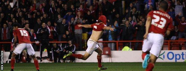 Eric Lichaj celebrates his long-range opener