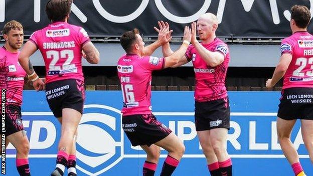 Liam Farrell scored the first of Wigan's three quickfire first-half tries