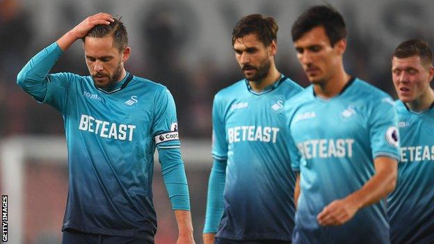 Swansea players dejected