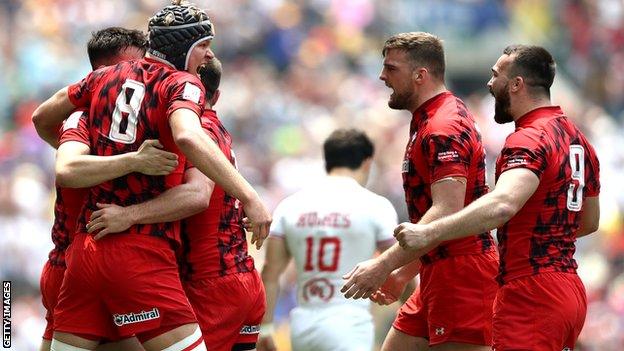 Wales celebrate after beating USA at Hong Kong Sevens in April