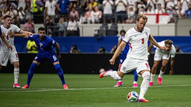 Harry Kane of England shoots a penalty kick to score his team's first goal during the FIFA World Cup 2026