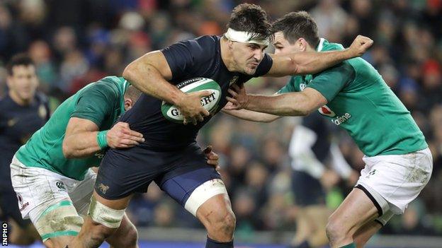 Tomas Lezana is tackled by Ireland's CJ Stander and Johnny Sexton