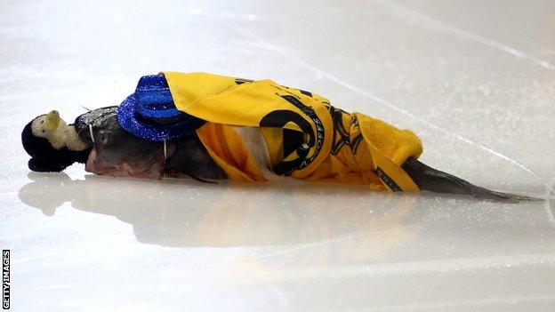 Catfish on the ice at Predators Penguins