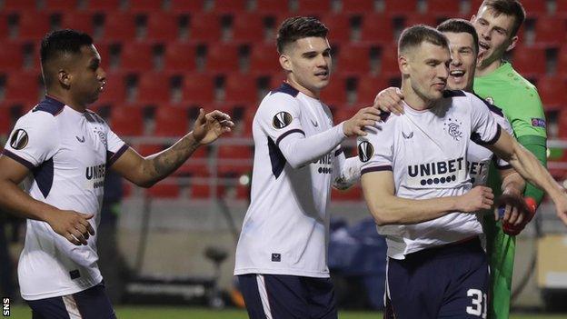 Borna Barisic (right) celebrates one of his two Rangers penalties