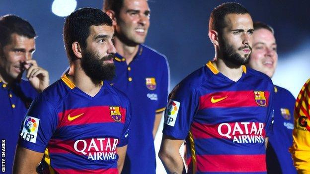 Barcelona's Arda Turan and Aleix Vidal