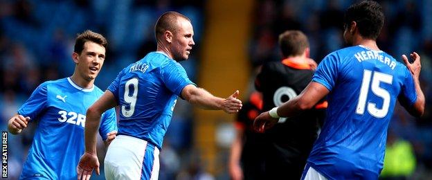 Kenny Miller (centre) celebrates scoring for Rangers against Sheffield Wednesday