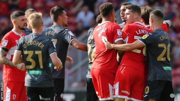 Middlesbrough and Swansea players clash