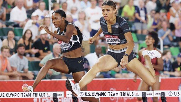 Dalilah Muhammad and Sydney McLaughlin compete in the Women's 400m hurdles