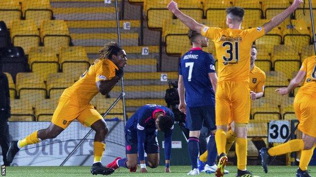 Livingston's Dolly Menga celebrates his goal