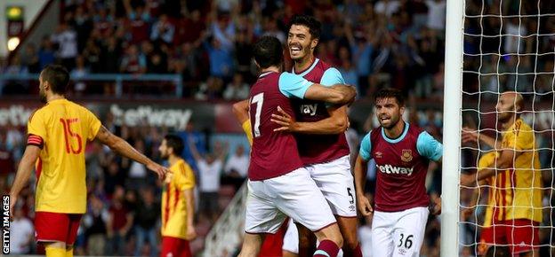 James Tomkins celebrates West Ham's winner in the first leg against Birkirkara