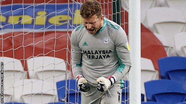 Dillon Phillips celebrates his penalty heroics